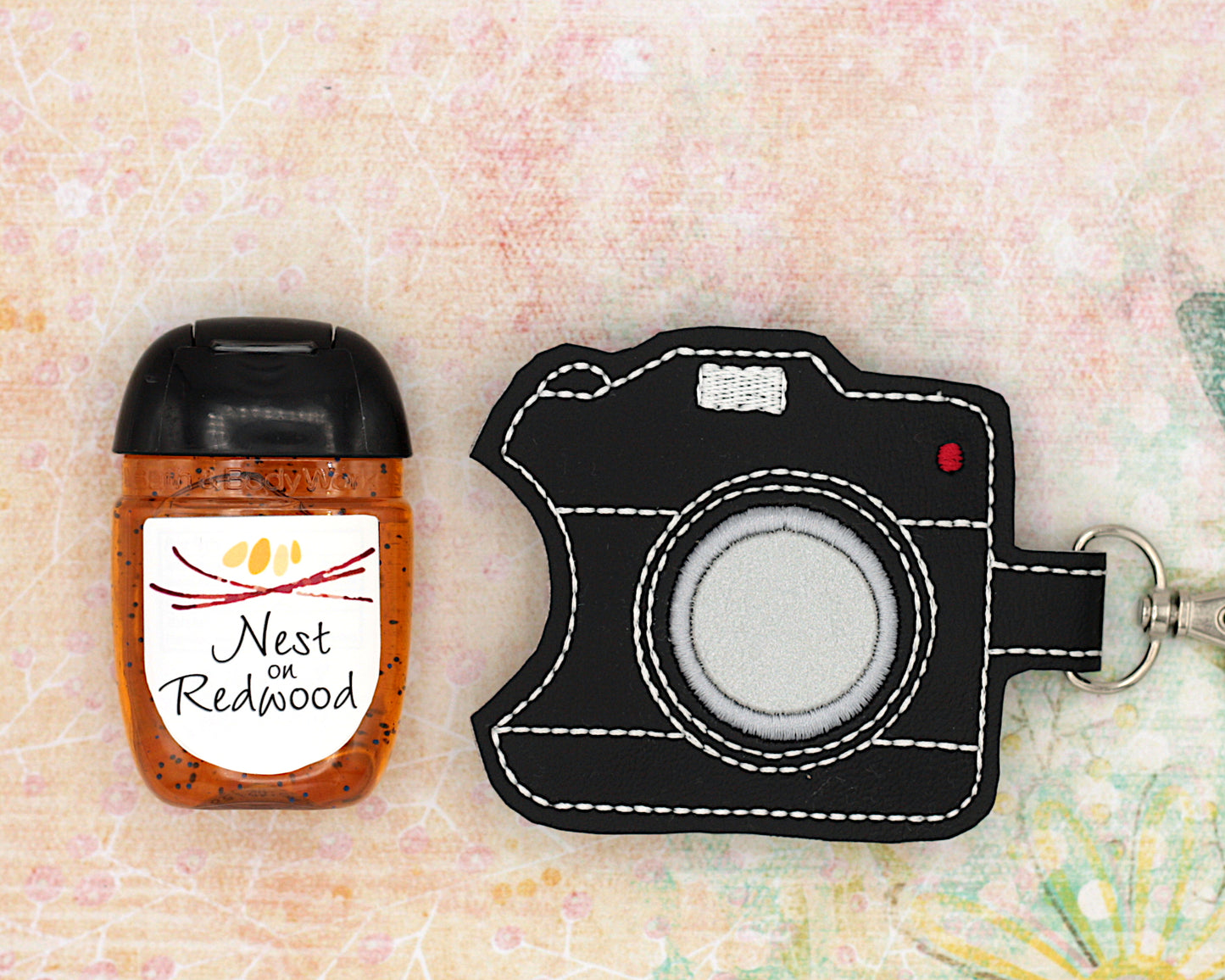 Camera Hand Sanitizer Holder