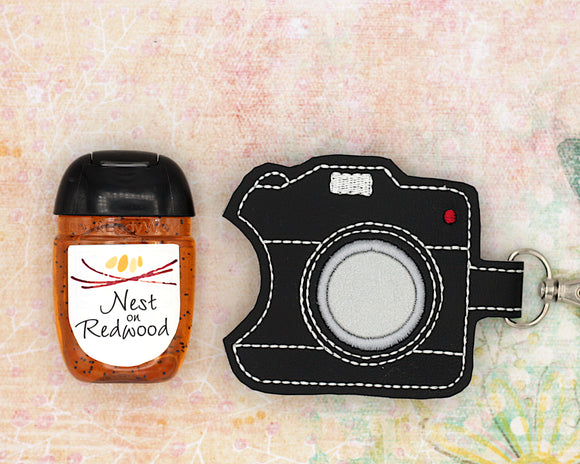 Camera Hand Sanitizer Holder